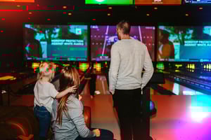 Group of young adults bowling at union social