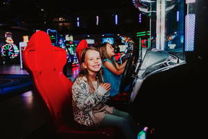 Kids playing at the arcade in Union Social.